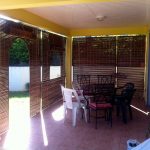 store porte arrondie teck